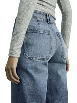 Jean en coton bleu uni avec une coupe droite et des passants pour ceinture