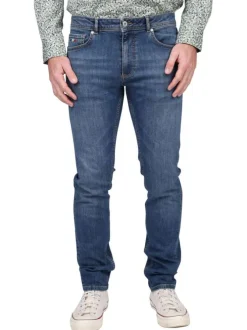 Jean en coton bleu uni avec une coupe droite et une étiquette d'authentification