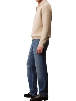 Jean en coton bleu uni avec une coupe droite à zip et à bouton
