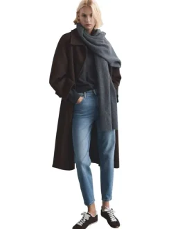Jean 7/8 en coton bleu uni avec une coupe mom et une taille haute
