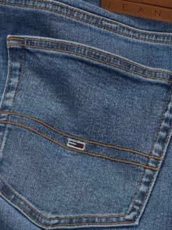Jean en coton bleu uni avec une coupe slim à zip et à bouton