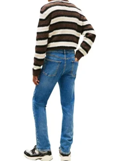 Jean en coton bleu uni avec une coupe slim à zip et à bouton
