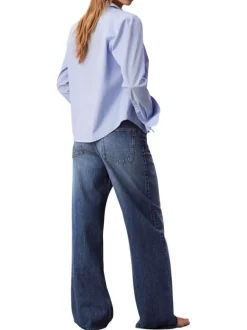 Jean en coton bleu uni avec une coupe wide leg à zip et bouton