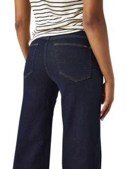 Jean en coton brut uni avec une coupe bootcut et coutures contrastées