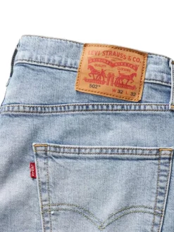 Jean 502® en coton ciel uni à coupe droite pourvu du patch de la marque