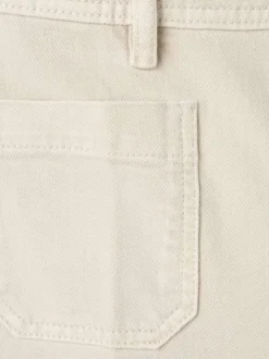 Jean en coton écru uni avec une coupe bootcut et 4 poches plaquées