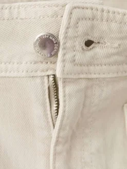 Jean en coton écru uni avec une coupe bootcut et 4 poches plaquées