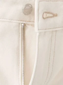 Jean en coton écru uni pourvu d'une coupe bootcut et d'une taille haute