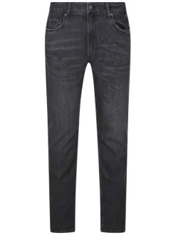 Jean en coton gris uni avec une coupe slim et un patch de la marque à la taille