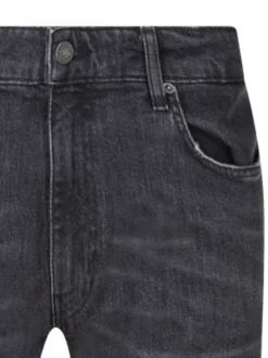 Jean en coton gris uni avec une coupe slim et un patch de la marque à la taille