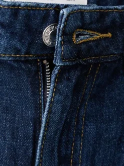 Jean en coton indigo avec une taille haute et une coupe bootcut