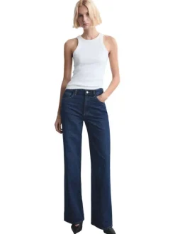 Jean en coton indigo avec une taille haute et une coupe bootcut