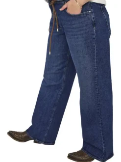 Jean en coton indigo coupe bootcut pourvu de passants pour la ceinture