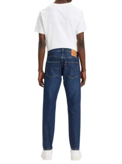 Jean 512 en coton indigo délavé avec une coupe slim et à 5 poches