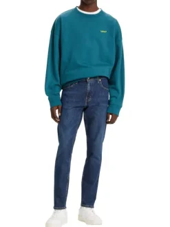 Jean 512 en coton indigo délavé avec une coupe slim et à 5 poches