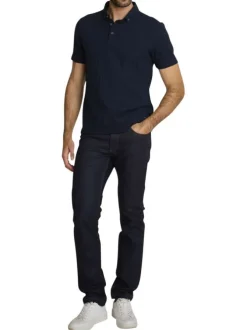 Jean en coton indigo uni avec une coupe ajustée et des surpiqûres camel
