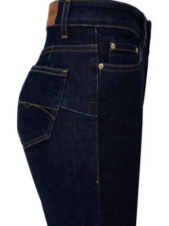 Jean en coton indigo uni avec une coupe bootcut et des surpiqûres caramel