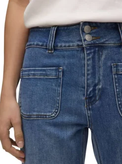 Jean en coton indigo uni avec une coupe bootcut et poches plaquées