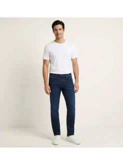 Jean en coton indigo uni avec une coupe slim à zip et bouton