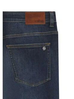 Jean en coton indigo uni coupe slim avec multiples poches