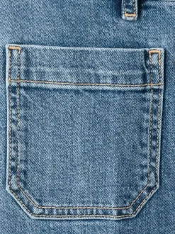 Jean en coton indigo uni pourvu de passants pour la ceinture