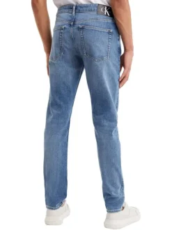Jean en coton mélangé bleu délavé avec une coupe slim et à 5 poches