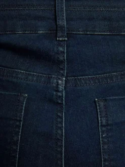 Jean en coton mélangé bleu marine à coupe bootcut et une taille haute
