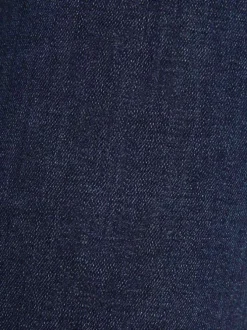 Jean en coton mélangé brut avec une coupe skinny et des passants