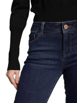 Jean en coton mélangé brut avec une coupe skinny et des passants