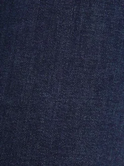 Jean en coton mélangé brut avec une coupe skinny et des passants