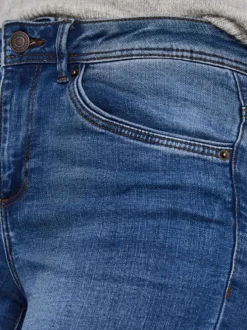 Jean en coton mélangé indigo effet délavé à coupe slim et taille haute