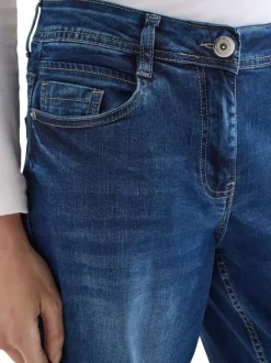 Jean en coton mélangé indigo uni pourvu d'une coupe droite et d'une taille haute