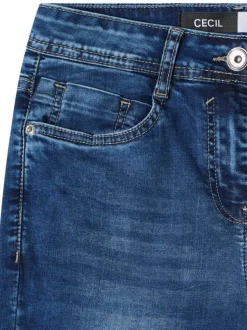 Jean en coton mélangé indigo uni pourvu d'une coupe slim et d'une taille haute