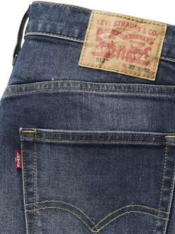 Jean 512® en coton mélangé marine à coupe slim pourvu de coutures contrastées