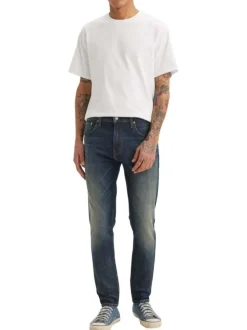 Jean 512® en coton mélangé marine à coupe slim pourvu de coutures contrastées