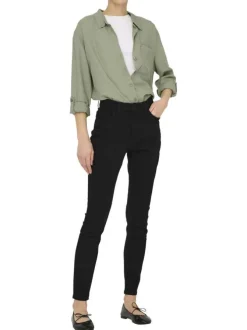 Jean en coton mélangé noir coupe slim pourvu de passants pour la ceinture