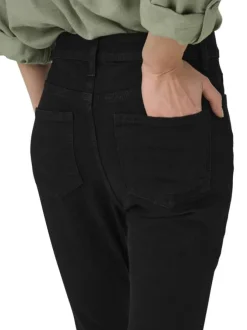 Jean en coton mélangé noir coupe slim pourvu de passants pour la ceinture