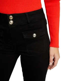 Jean en coton mélangé noir uni à coupe bootcut avec boutons chromés