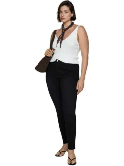 Jean en coton noir uni taille haute à coupe skinny avec rivets cuivrés