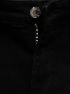 Jean en coton noir uni taille haute à coupe skinny avec rivets cuivrés