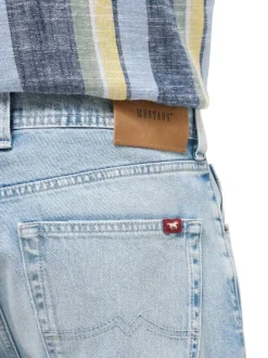 Jean en coton stone uni pourvu d'une coupe bootcut et de multiples poches