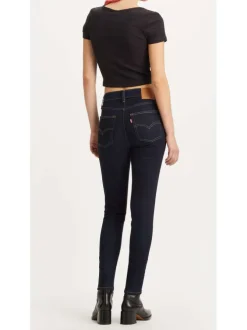 Jean 721™ High Rise en coton mélangé brut uni avec une coupe skinny