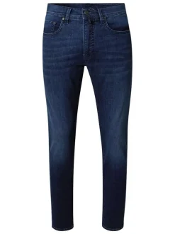 Jean indigo avec une coupe ajustée et une fermeture zippée avec un bouton