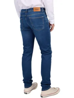 Jean indigo délavé avec une coupe ajustée et des passants pour la ceinture