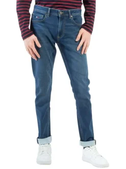 Jean indigo délavé avec une coupe ajustée et des passants pour la ceinture