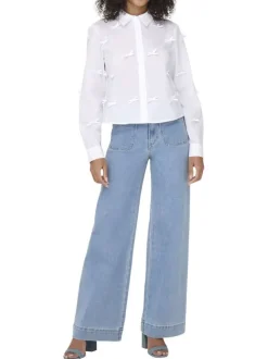 Jean Madeline en coton mélangé bleu uni avec une coupe flare