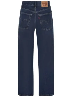 Jean Middy Loose Boot en coton indigo avec une coupe droite