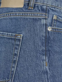 Jean Nice en coton bleu uni à coupe slim et avec deux poches arrière