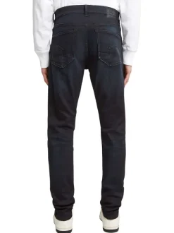 Jean noir avec une coupe slim à poches et des passants pour ceinture