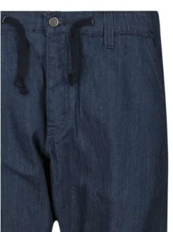 Jean otsu en coton indigo uni pourvu d'une coupe large et de multiples poches